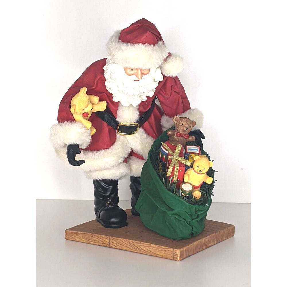 Fabrique Santa with Bag of Toys Face and Toys are Hard Resin? 9.5 x 8.5"